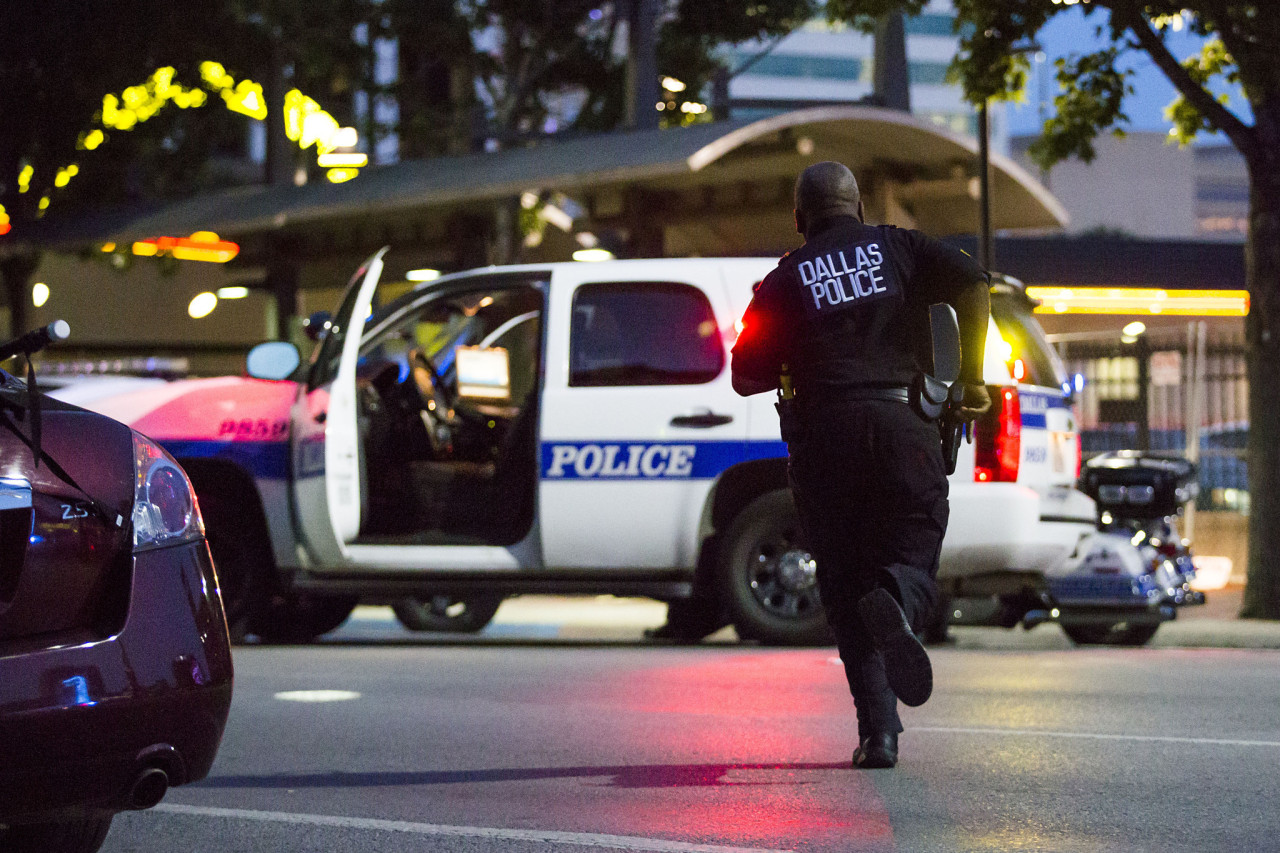 verdigris113:  Police Officers in Dallas bravely secure the city in the wake of a