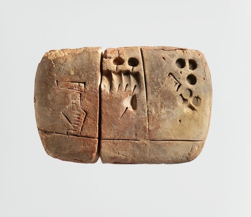 Sumerian cuneiform tablet (c. 3100 – 2900 BC).  Administrativeaccount with entries concerning malt a