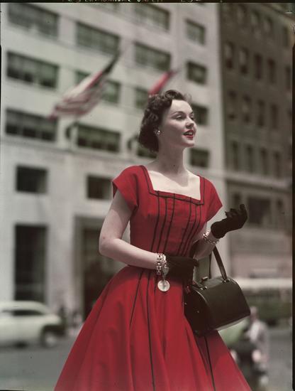 bigcityvintagenyc:  Fifth Avenue, Women modeling on the sidewalk in 1952.  