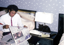 spiritsdancinginthenight:  Michael Jackson reading a newspaper article about Prince, 1984. 