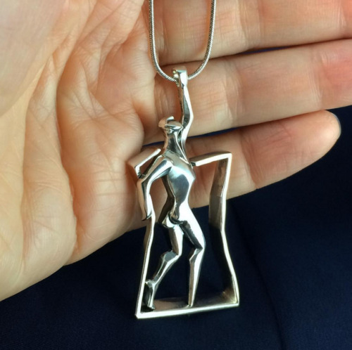 Out of frame silver pendant