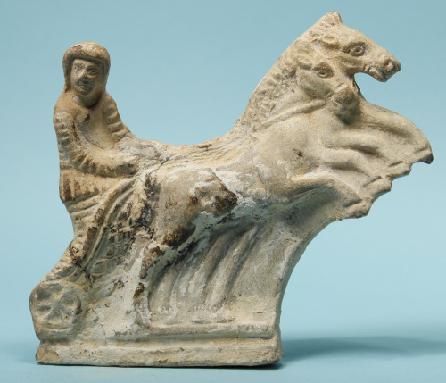 rodonnell-hixenbaugh: Roman Terracotta Charioteer An ancient Roman terracotta statuette of a chariot