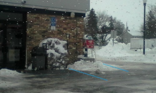 The only accessible parking space for the convenience store I used to work at. Blue lines show where