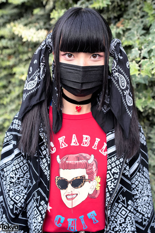 Japanese student Hatsune on the street in Harajuku with a mask, a bandana-wrapped twintails hairstyl