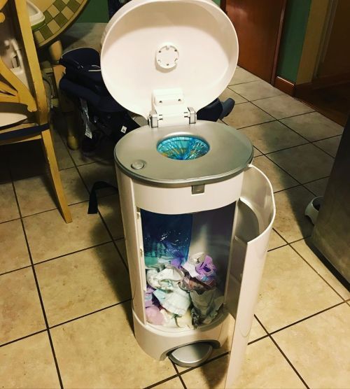 Parenting Fail: Forgetting to tie the diaper pail bag after getting rid of diapers last time it was 