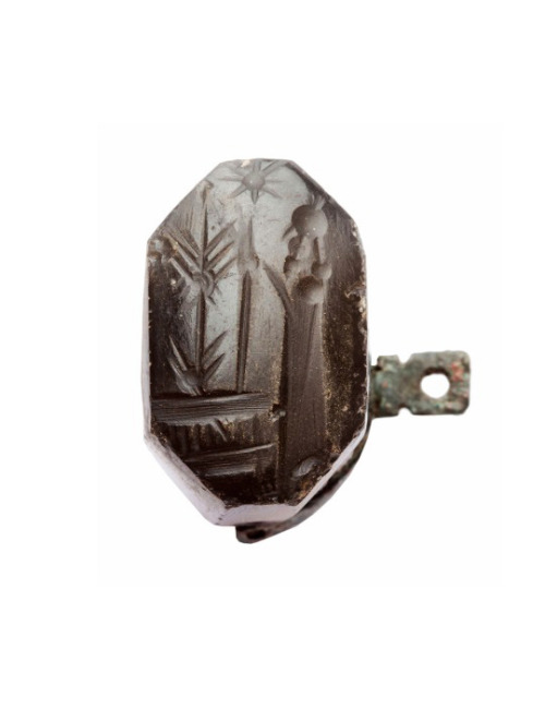 Babylonian seal, depicting a praying man in front of divine symbols.  Stamp and cylinder seals, betw