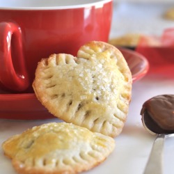 cookingwithmanuela:  Say hello to my ❤ My heart is sweet and warm … and stuffed with smooth and creamy chocolate, of course :) These hand pies are all you love about pie crust and spreadable chocolate bundled up in cute and most dangerous heart-shaped