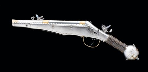 A rare two shot (superimposed load) wheel-lock pistol dated to 1609.  Crafted by Valentin Klett of S