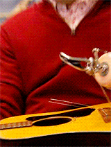  Buster tries to forget his recent losses by breaking out the old guitar… 
