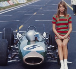 toneburst:  Francoise Hardy sitting on a Formula One race car during the filming of Grand Prix, 1966