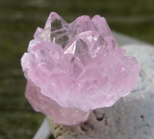 seyelle:  Lovely rose quartz crystals. I wish my camera and I could agree on better quality photos of this one. 