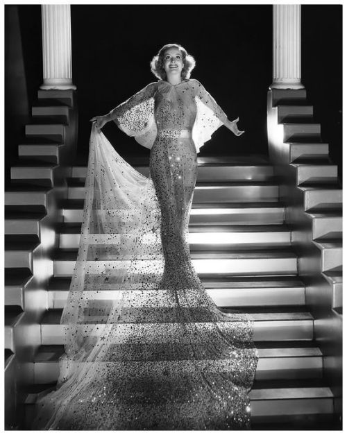 twixnmix:  Joan Crawford photographed by George Hurrell in an Adrian designed gown for the film Danc