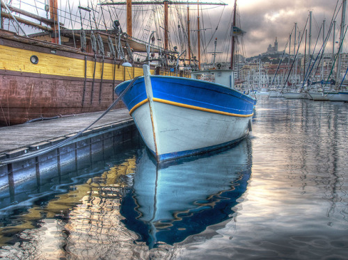 Boat Reflection by marcovdz on Flickr.