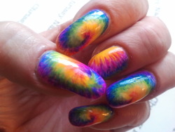 nailpornography:   My hand painted Tie Dye nails for NOTW. I used about 12 different nail polishes for this.  submitted by chrissynailart like these nails? GO VOTE