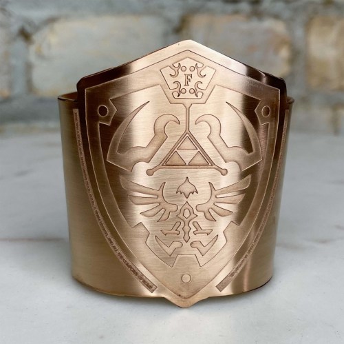 retrogamingblog2: Zelda Hylian Shield Cuff Bracelet made by TailoredMetal