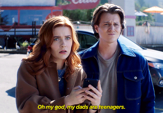 GIF FROM EPISODE 3X07 OF NANCY DREW. NANCY AND ACE ARE STANDING IN THE PARKING LOT OF THE CLAW LOOKING IN HORROR AT SOMETHING OUT OF FRAME. NANCY SAYS "OH MY GOD, MY DADS ARE TEENAGERS."