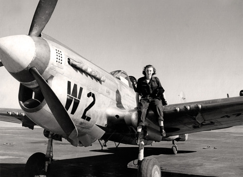 usaac-official:WASP Dorothy Dodd sits on the wing of a P-40N at Fort Sumner, New Mexico, 1944