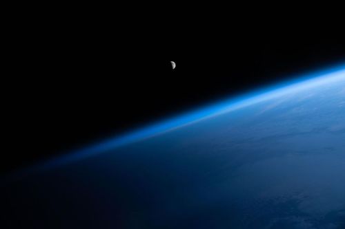 Crescent Moon Over The Blue Earth