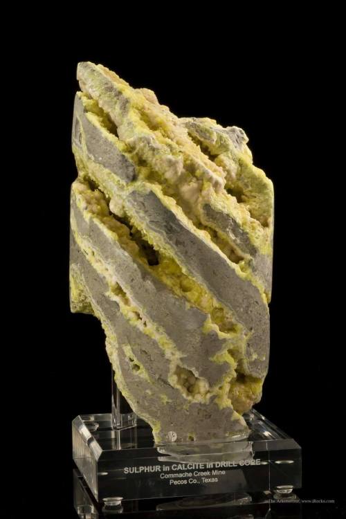 Sulphur crystals in a drill coreThe oil fields of Texas and Louisiana are trapped in domes of salt d