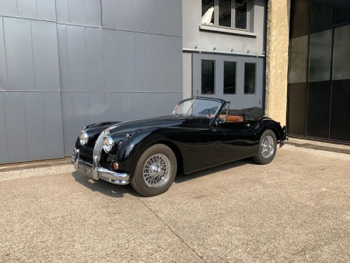 Frenchcurious:  Jaguar Xk140 3.4. - Source Motorlegend.