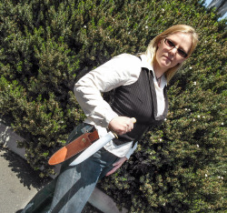 coldsteelknives:  Cold Steel crew member Tracy with the rare Carbon V Stag Handle Trail Master www.coldsteel.com