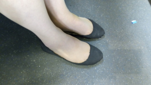 Wearing nude Silkies tights & my battered ballet pumps on the train back from a meeting.