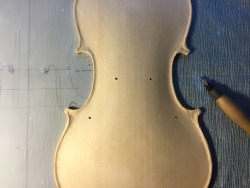 azureviolin:  Cutting the sound holes. 