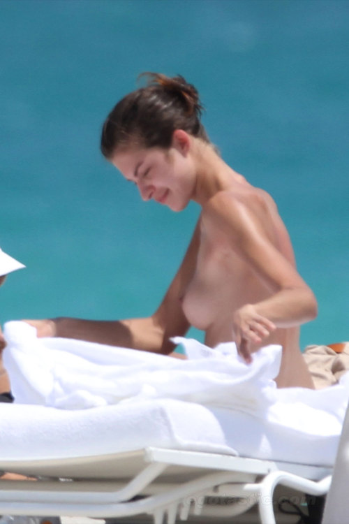 toplessbeachcelebs:  Yaya Kosikova (Model) sunbathing topless in Miami Beach (March 2011) 