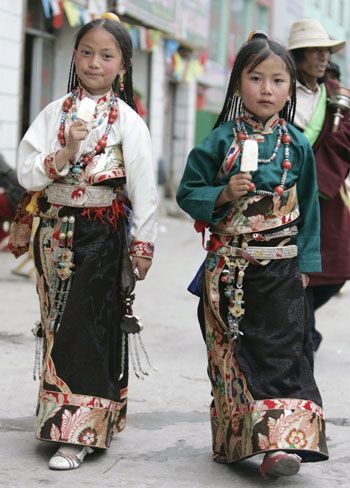 Women of Tibet (click to enlarge)8. Traditional turquoise jewelry, Lhasa, Tibet by Nora de Angelli