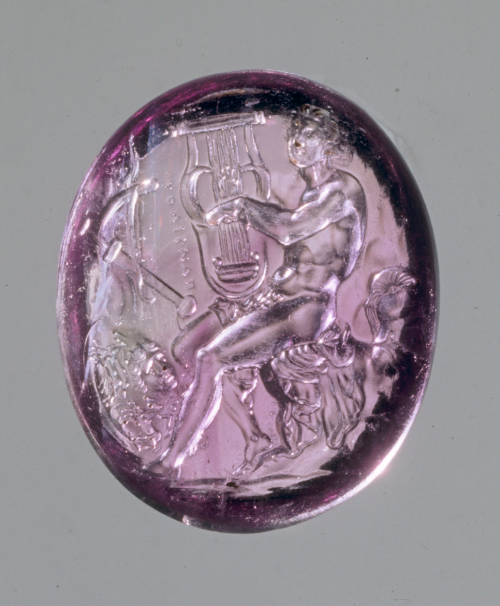 gemma-antiqua:Ancient Greek amethyst intaglio of Achilles playing the cithara, dated to 75-50 BCE. C