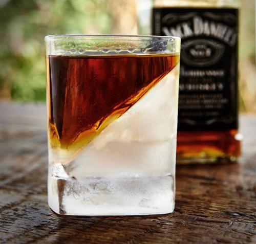 odditymall: The whiskey wedge is a cocktail glass that is meant to reduce the watered down effect th