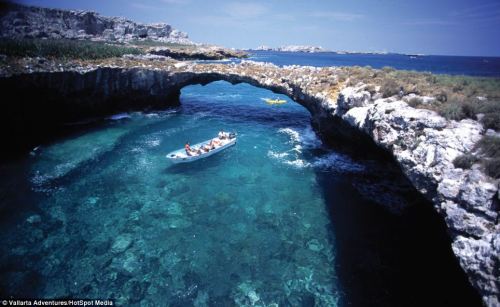 sixpenceee:  Views of the Hidden Beach, located on the Marieta Islands in Peurto Vallarta.   This secluded paradise, with its sandy beaches and crystal clear warm water, is believed to have formed decades ago when it was used as target practice by the