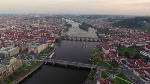 The Vltava running through Prague, with the Charles Bridge in the background, and the Mánes Bridge i