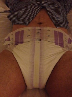 thediaperedengineer:  For someone as bossy and Dom as guysingear, I’m way better at diapering him than he is at me. At least he’s representing my team. \m/ hook em horns  Yeah. He was fidgeting and being impatient. Did the best I could do under the