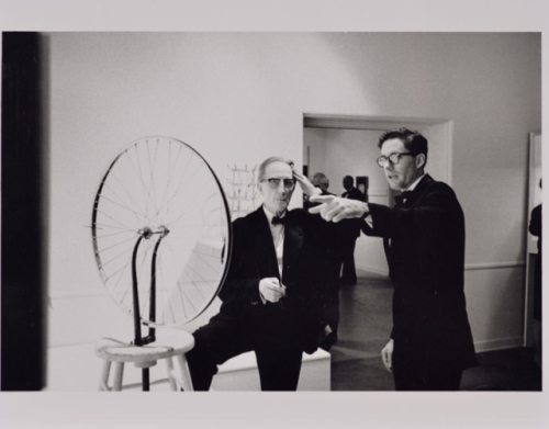 Duchamp with Walter Hopps Pointing, Duchamp Retrospective, Pasadena Art Museum, 1963
