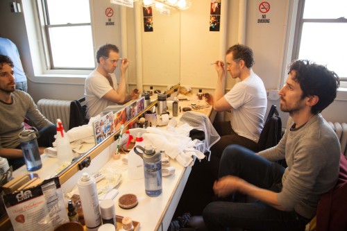 Dennis Moench and Adam Monley at their dressing room stations preparing for the show. Photo by maxgo