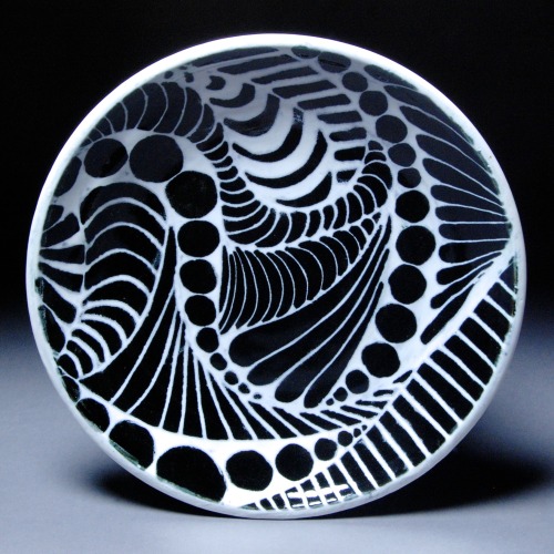 Glaze-Carved Dinner Plates, 2014by Emily Rose Bourne Thrown porcelain with black and white glazes fi