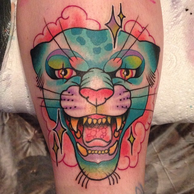 rizzabootattoos:  Disco panther from today at Galway Tattoo Show 💚💙💜💛