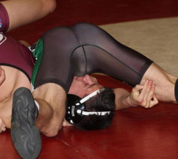 navyfistfighter:  Got to love wrestling. Only in wrestling could two guys end up in a position like this, and it would be considered completely normal.