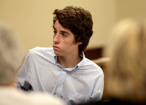 Chardon High School shooter Thomas T.J. Lane listening to testimony (May 24, 2012)