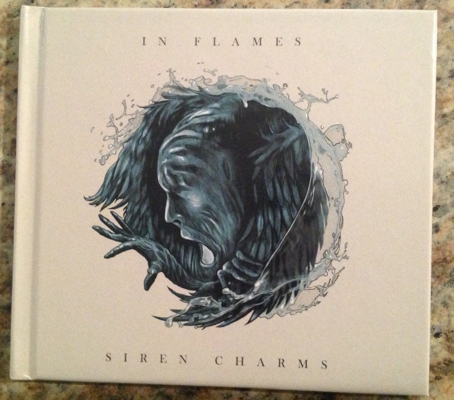 Got the new In Flames today! I got the hardcover version,its like a book with a bonus