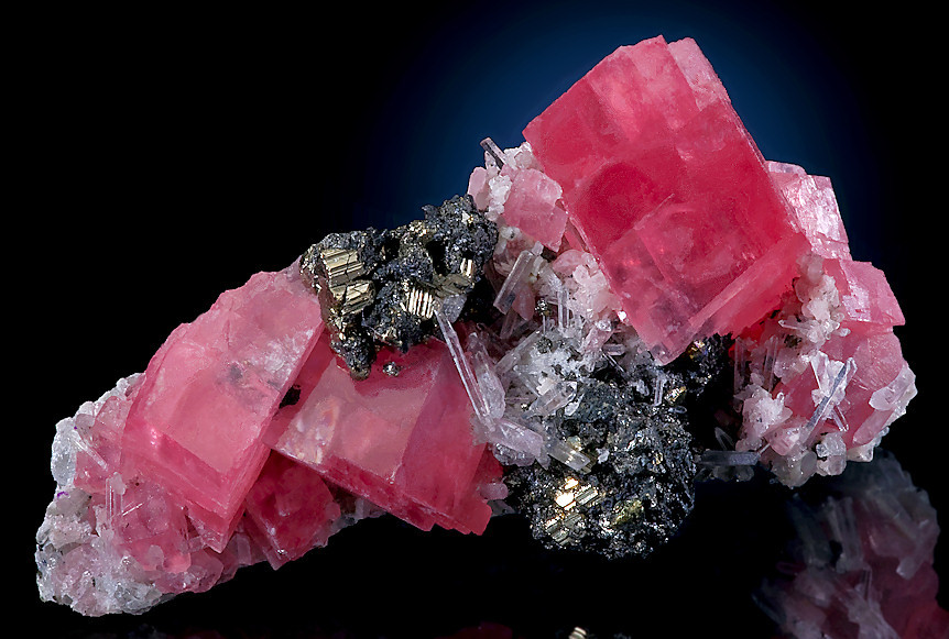 fuckyeahmineralogy:  Rhodochrosite with quartz, pyrite, and tetrahedrite; Sweet Home