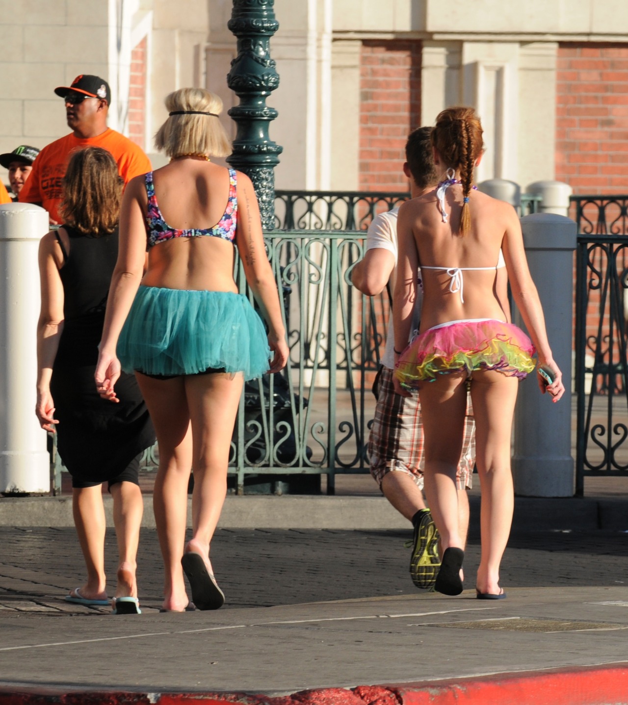 These are from the Electric Daisy Carnival. The one in the rainbow tutu has a very