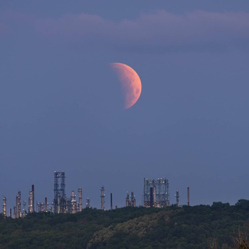Moonrise over the refinery.