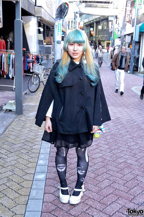 Japanese fashion student on the street in Koenji w/ green bangs hairstyle, sheer H&M skirt, grap