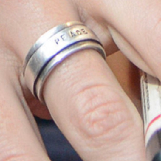 What Is Harry Styles' Peace Ring and What Does It Signify to Him?