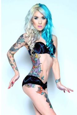 Have a thing for tattooed girls and girls with unnaturally dyed hair.  This pic just hits a sweet spot for me.