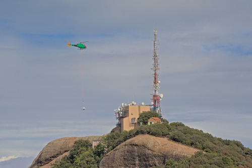 Helicopter over Montserrat mountains