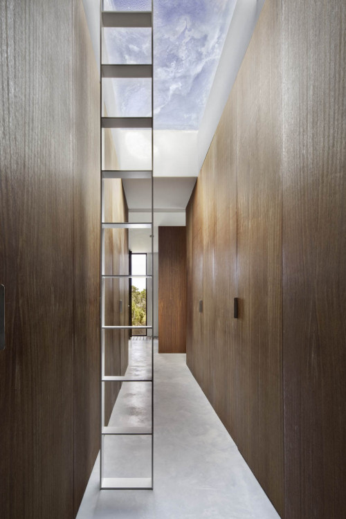 {Minimalist with some cute details… love the ladder thing in the dressing room/hall… a
