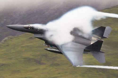 planesawesome:   Bleed Red&quot; 494th FS F-15E Strike Eagle Warm air…plus light rain….add a little “G” at low level…. = VAPOUR   